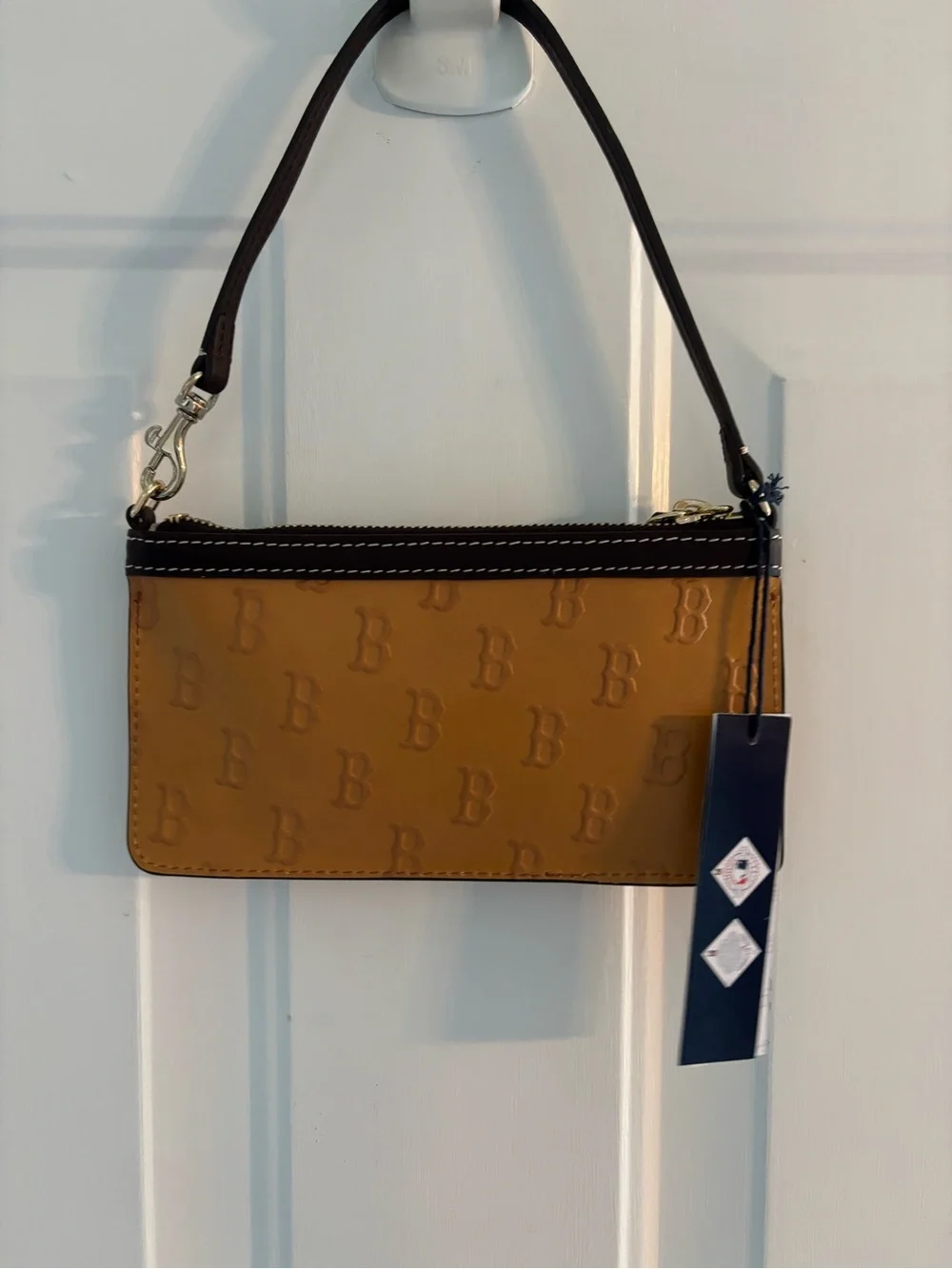 Dooney & Bourke Mustard Yellow Logo-Embossed Wristlet with Brown Trim